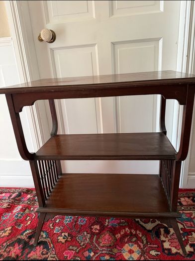 Mahogany table with glass top.