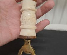 Carved bone and Copper bottle opener Zambia