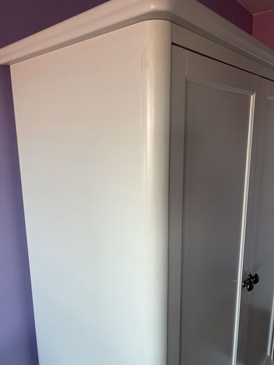 White double door high wardrobe with bottom drawer and shelf