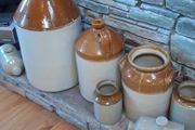 Collection of Eight Antique Stoneware Jars including Two Antique Hot Water Bottles