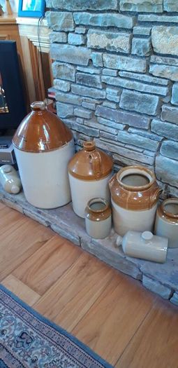 Collection of Eight Antique Stoneware Jars including Two Antique Hot Water Bottles