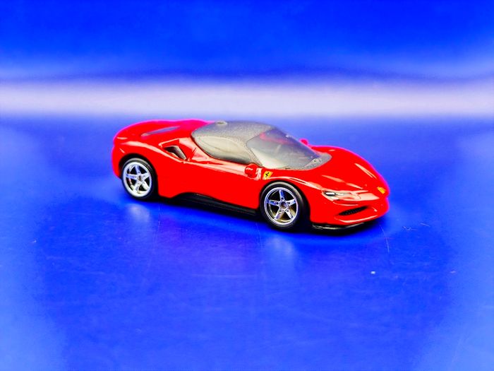 Hot Wheels Ferrari SF90 Stradale with custom wheels.