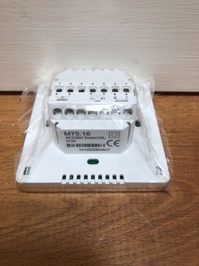 Chrome/Stainless Programable thermostat