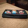 black faux leather wallet,featuring three embroidered Japanese Kokeshi doll Image 2