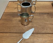 Silver teapot /Sugar bowl /milk jug and cake slice