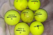 (7) Yellow colored golf ball