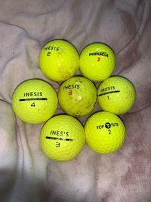 (7) Yellow colored golf ball