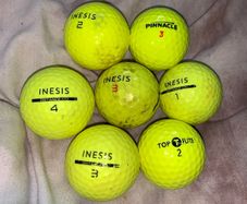 (7) Yellow colored golf ball