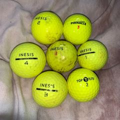 (7) Yellow colored golf ball