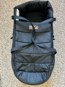 Mountain Buggy Newborn Cocoon with bassinet cushion and sheets