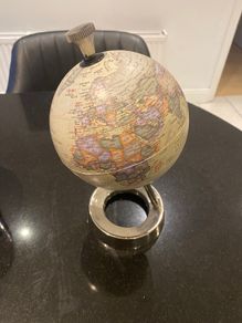 Globe on metal stand
