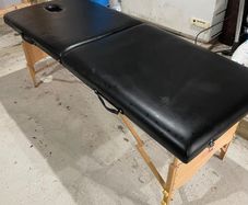 Foldable massage table