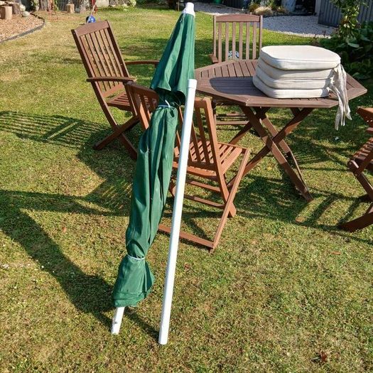 Garden table and chairs, parasol and cushions