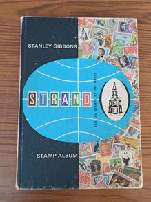 Vintage Stanley Gibbons Strand stamp album  1979  with stamps of various countries including Ireland