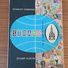 Vintage Stanley Gibbons Strand stamp album  1979  with stamps of various countries including Ireland