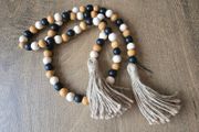Wooden beaded garland - brown