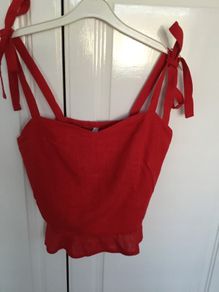 Red linen top. Elasticated back. Size L