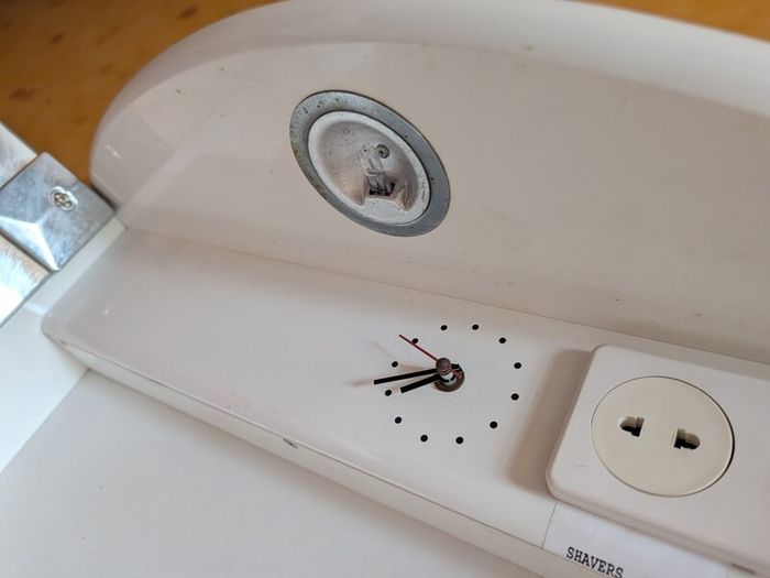 Bathroom Cabinet c/w clock, light and shaving socket