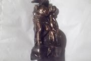 a bronze or metal the death of cuchulainn statue