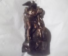 a bronze or metal the death of cuchulainn statue