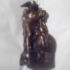 a bronze or metal the death of cuchulainn statue