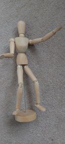 Wooden poseable wooden figurine