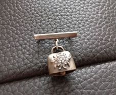 Cow bell brooch silver