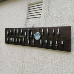 vintage sparkplug display board