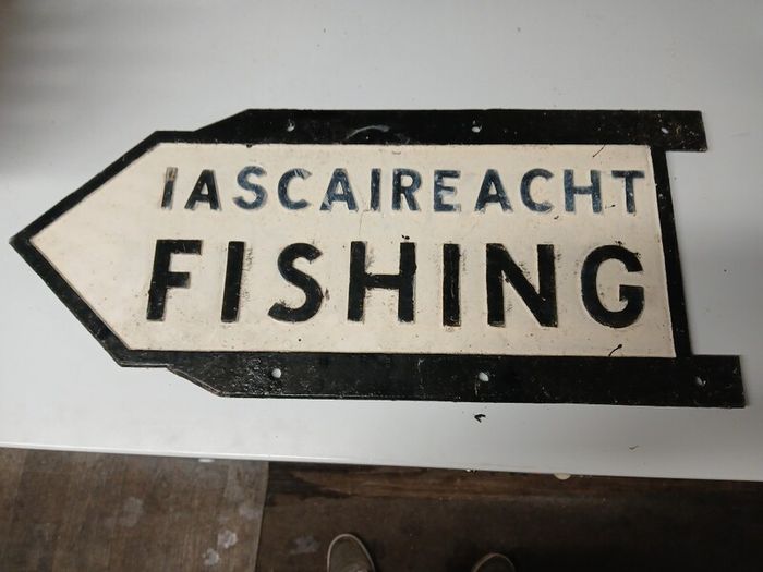 old road sign fishing