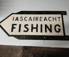 old road sign fishing
