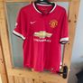 Assortment of Manchester United Jersey's. Image 6