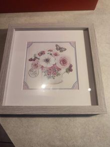 Framed Flowers vase stamped photo.
