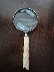 Antique carved spiral horn handle magnifying glass