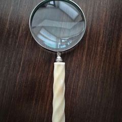 Antique carved spiral horn handle magnifying glass