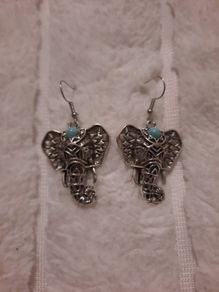 silvertone elephant head earrings