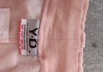 orange tracksuit bottom fits size sm worn