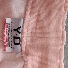 orange tracksuit bottom fits size sm worn