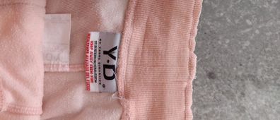orange tracksuit bottom fits size sm worn