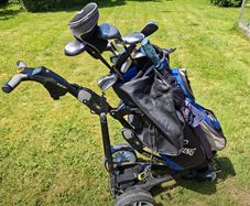 Golf buggy & clubs