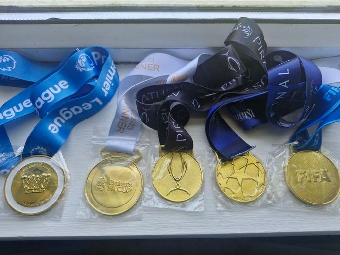 Collection of Brand new Man City Winners Medals