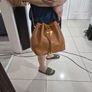 Nina Ricci pebbled leather bucket bag Image 7