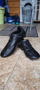 Concave football boots