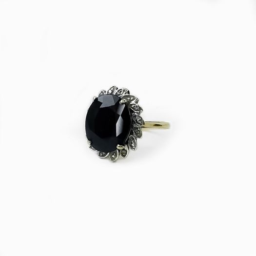 9ct Gold ring with a large sapphire and diamonds