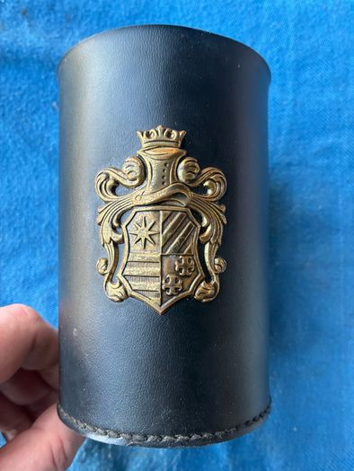 Vintage pint glass in leather holder