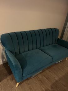 Teal green velvet sofa