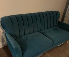 Teal green velvet sofa