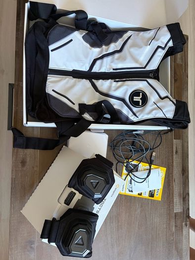 bHaptic tactsuit and tactsleeve