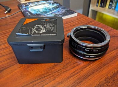 Camera lens adapter