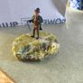 A gentleman holding a walking stick, mounted on what appears to be an onyx or serpentine stone base as ashtray or pine holder.Royal Doulton Figure "Owd Willum . Designed by L Harradine it was issued between 1949 and 1973. Image 2