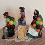 Vintage porcelain figurines family of balloon sellers by Royal Doultot . 85 euro each Image 8